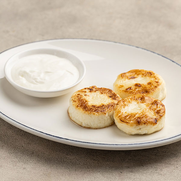 Фото Сырники со сметаной